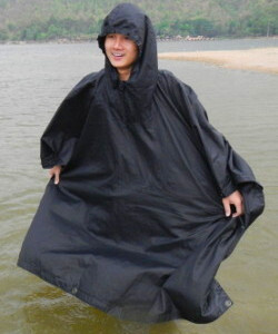 hiking in wet poncho cape